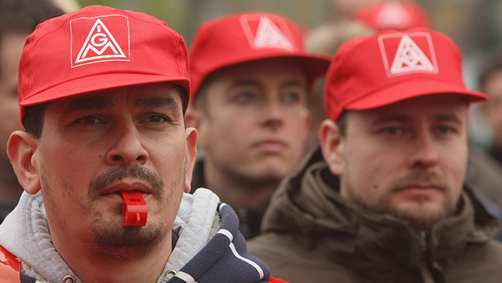 Workers represented by IG Metall attend a 2008 rally for higher pay.