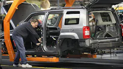 A worker builds a Jeep Compass at the Fiat Chrysler plant in Belvidere, Illinois. A worker builds a Jeep Compass at the Fiat Chrysler plant in Belvidere, Illinois.
