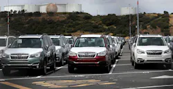 New cars sit in a lot at the Auto Warehousing Co. near the Port of Richmond. New cars sit in a lot at the Auto Warehousing Co. near the Port of Richmond.