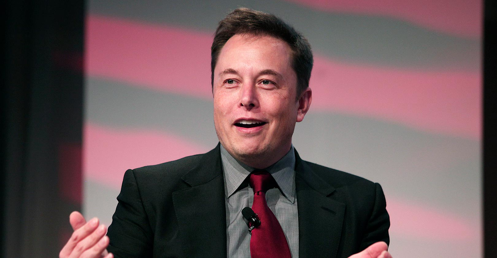 smiling Elon Musk