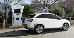 Hyundai NEXO fuel-cell powered vehicle at fueling station Hyundai NEXO fuel-cell powered vehicle at fueling station
