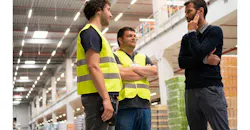 manager speaking with employees manager speaking with employees