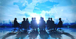 team around table, blue background team around table, blue background