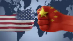 American flag colliding with Chinese flag painted on fists American flag colliding with Chinese flag painted on fists