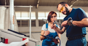 Worker Using Cnc Machine Training Supervisor Istock Getty