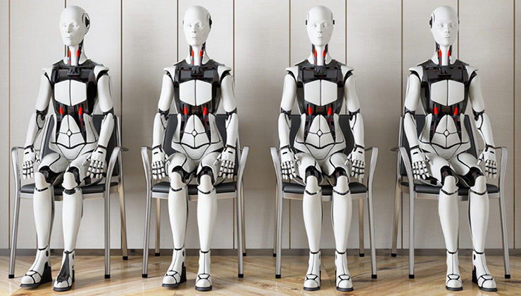 robots seated in chairs