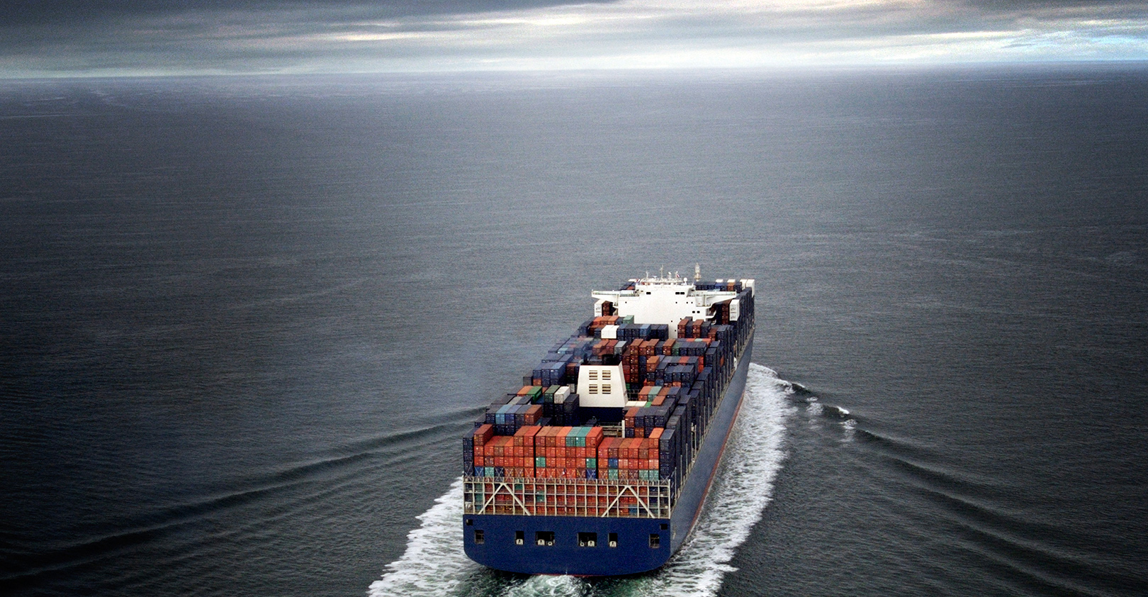 Shipping Container Ship Cloudy Skies Istock Getty 5e74e7c2af7e7