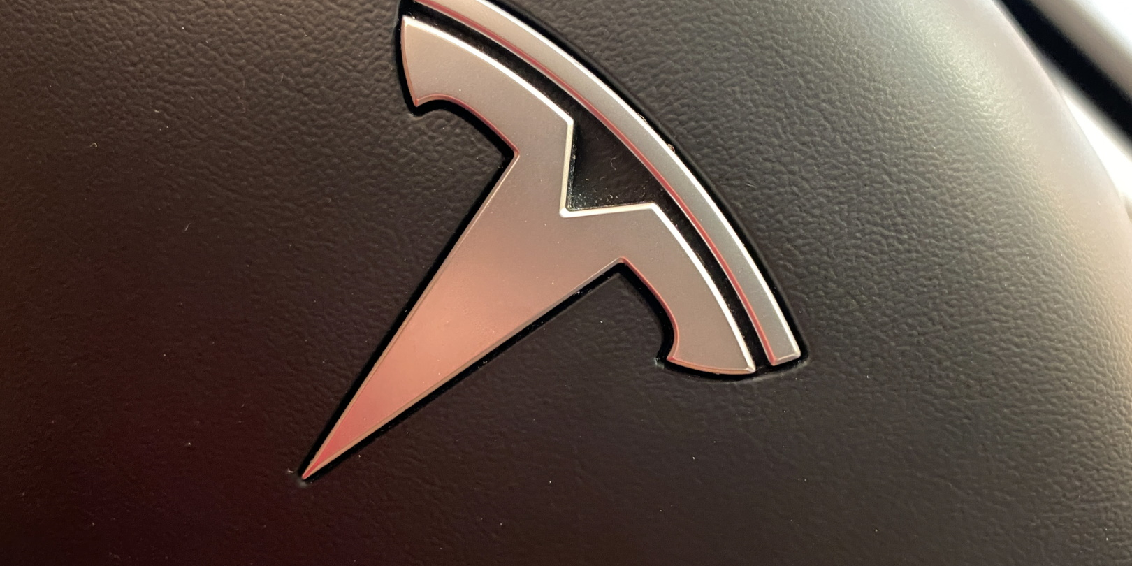 Tesla Logo Steering Wheel Detail Joni Hanebutt Dreamstime 5fbe04c880015