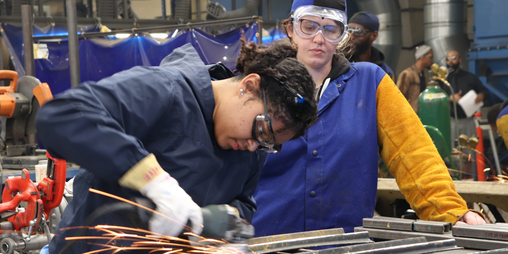 Woman With Tool Sparks Metal Grinder Superviser Goggles Manufacturing Ptti Edu On Unsplash 5fa1d397797c7