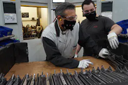 GM Jim Barbaretta gets trained on the line during a monthly “Management Build” event. GM Jim Barbaretta gets trained on the line during a monthly “Management Build” event.