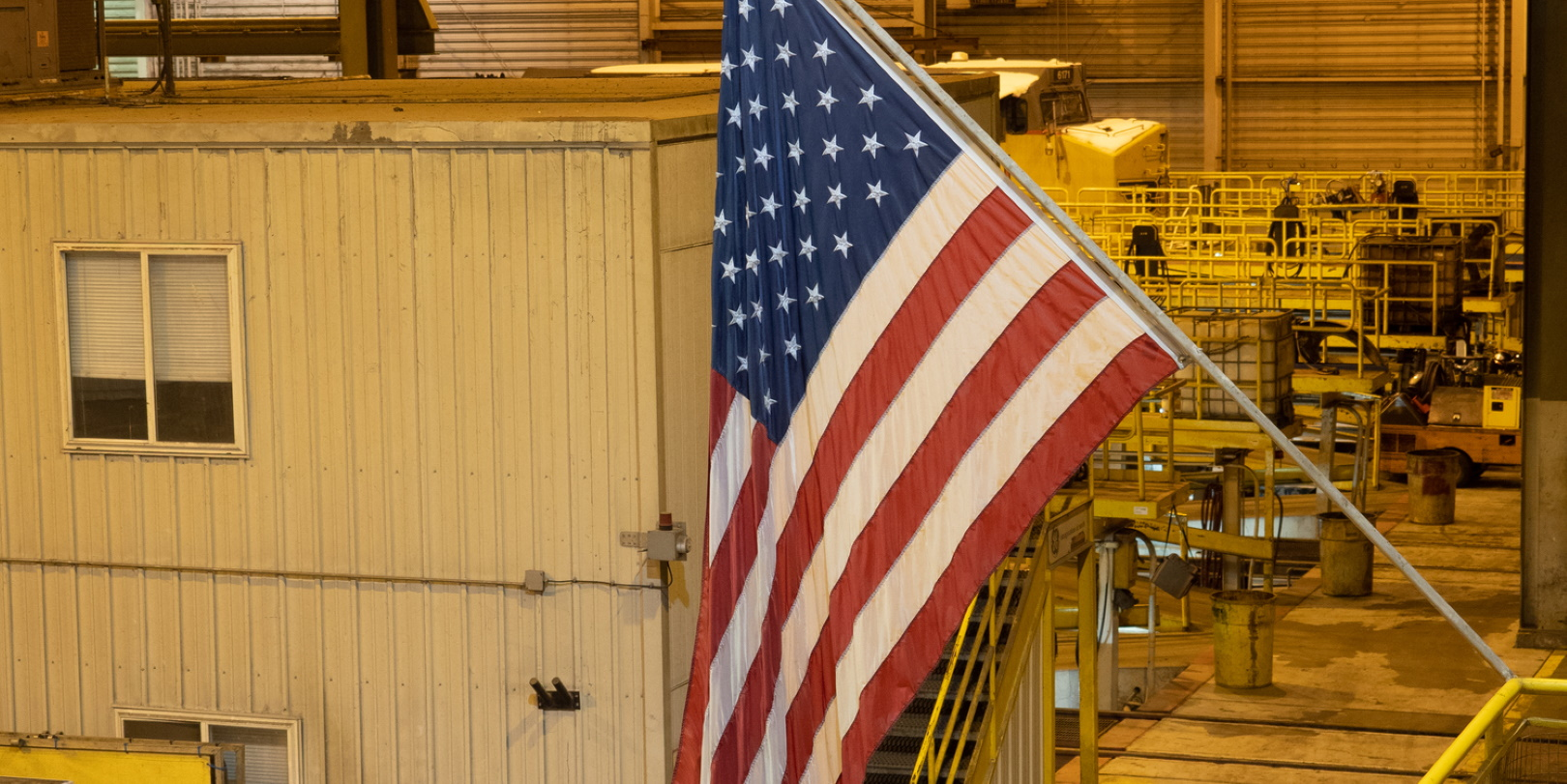 Us American Flag In Factory Setting Yellow Bg Reshoring Id 163250898 Tloventures Dreamstime 63078e71197d8