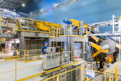 A team member operates a robotic marker at the end of the pickle line at the tandem cold mill in Big River. A team member operates a robotic marker at the end of the pickle line at the tandem cold mill in Big River.
