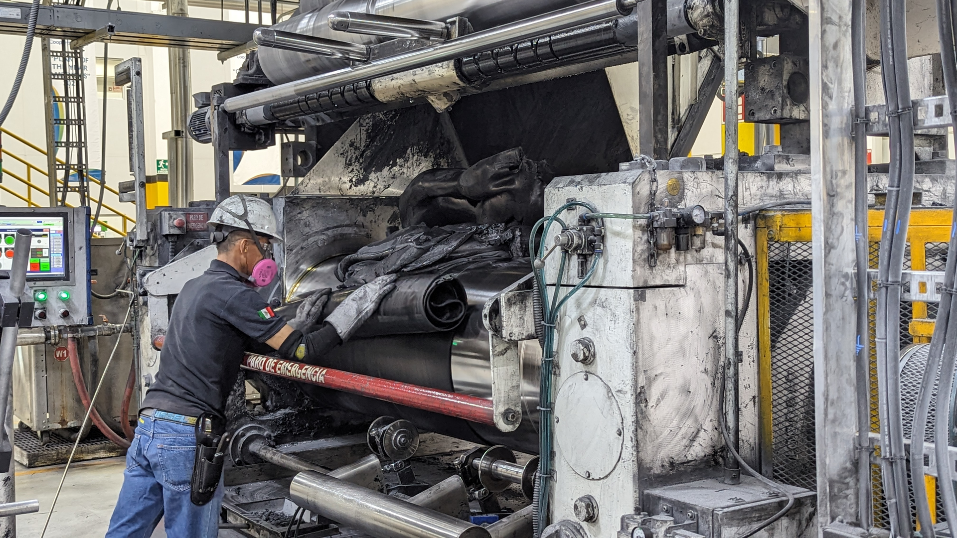Mill operators are the most highly skilled employees at Cooper Standard's Aguascalientes plant. They're responsible for rolling hot synthetic rubber to the correct thickness for use in downstream products.
