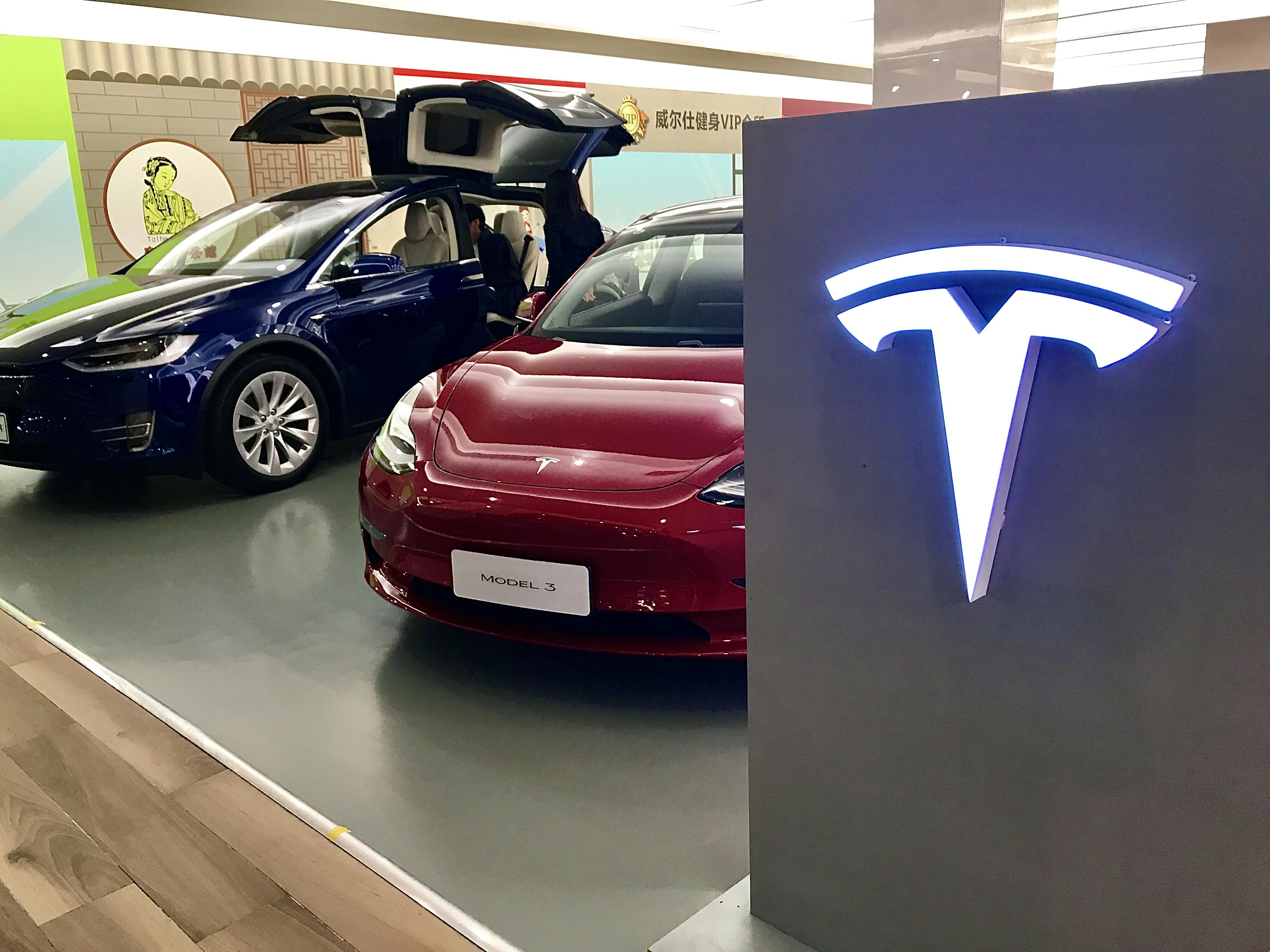 A Tesla showroom in Shanghai offers shoppers a chance to look at electric vehicle options.