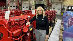 Anna Dibble stands beside some of the machinery installed for production of Cummins's 2027 X15 engine, at the Jamestown Engine Plant. Anna Dibble stands beside some of the machinery installed for production of Cummins's 2027 X15 engine, at the Jamestown Engine Plant.
