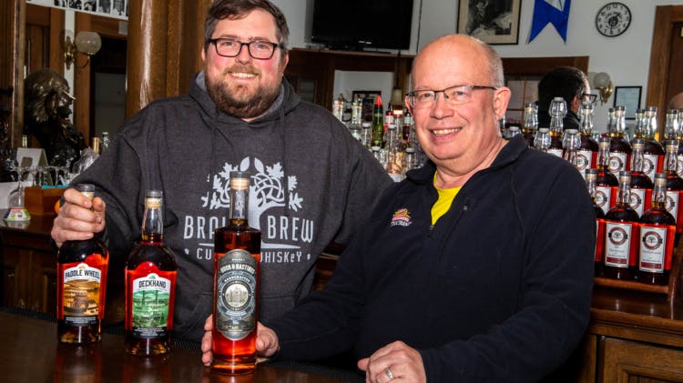 Doug Hall, right, and Joe Girgash, founders of Brain Brew Distillery. Doug was formerly a brand manager at Procter & Gamble.