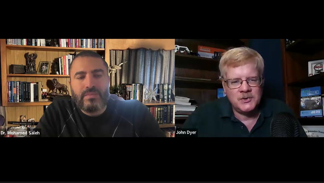 Screen capture of Mohamed Saleh on left and John Dyer on right, talking. Only their heads are visible.