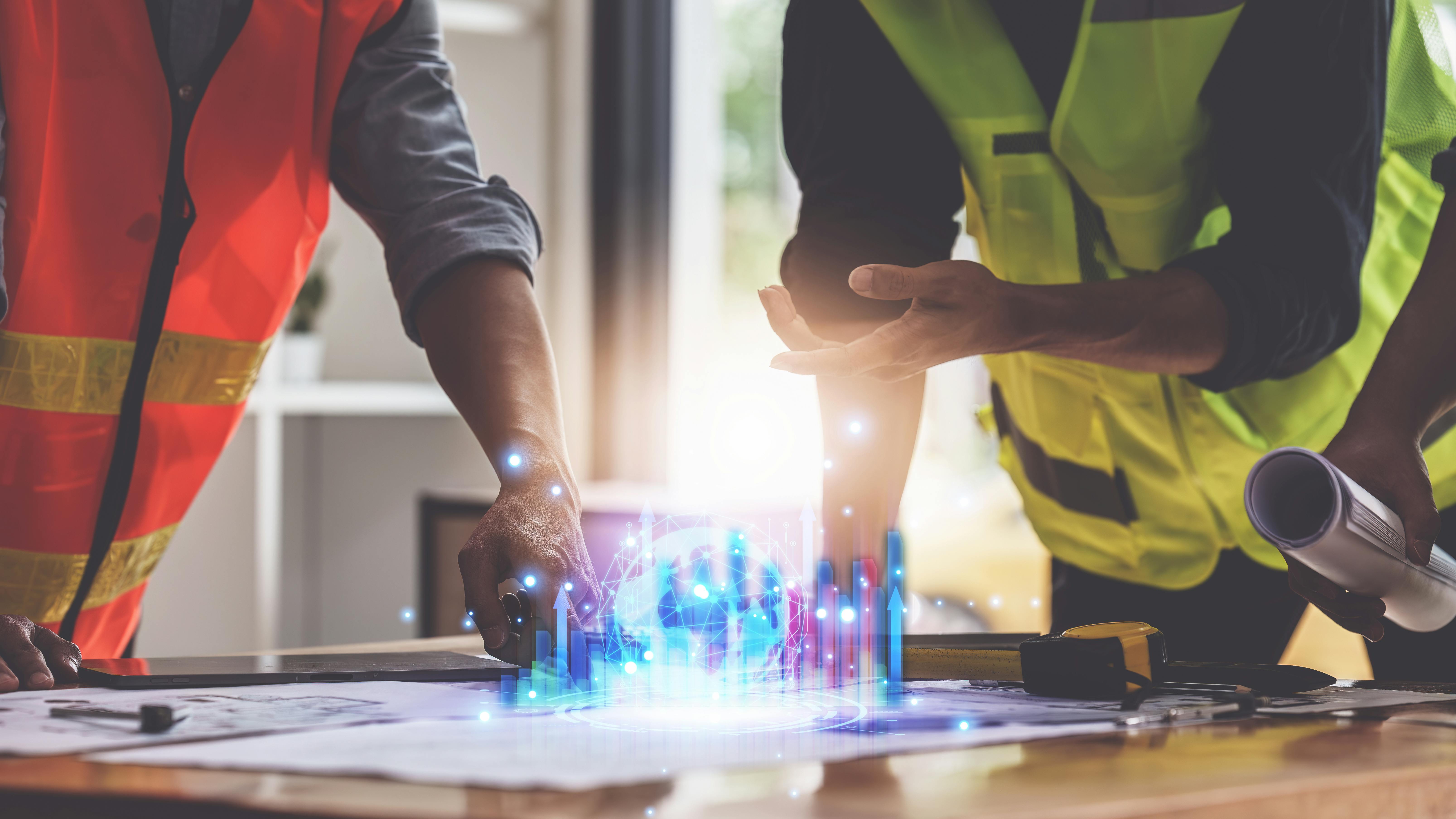 Designers and Engineers working with bluepirints