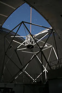 Like the Keck I Telescope's laser, shown here, the Keck II Toptica laser will launch from behind the telescope's secondary mirror. The laser will be more powerful as well as non-pulsing, which allows it to create a brighter guide star. The guide star is used to measure starlight-bending turbulence in Earth's atmosphere that is then canceled out with a deformable mirror in the adaptive optics system Like the Keck I Telescope's laser, shown here, the Keck II Toptica laser will launch from behind the telescope's secondary mirror. The laser will be more powerful as well as non-pulsing, which allows it to create a brighter guide star. The guide star is used to measure starlight-bending turbulence in Earth's atmosphere that is then canceled out with a deformable mirror in the adaptive optics system