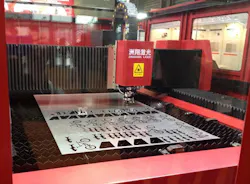 Exhibits at the 2013 Laser World of Photonics conference in Shanghai were big and full of photonics equipment, such as this laser cutting system from Wuxi Zhouxiang Laser Machinery. Exhibits at the 2013 Laser World of Photonics conference in Shanghai were big and full of photonics equipment, such as this laser cutting system from Wuxi Zhouxiang Laser Machinery.