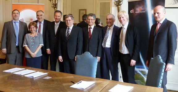 In the picture, from left to right: L&oacute;r&aacute;nt Lehrner (ELI-ALPS), Maria Douka (DG Research and Innovation, EC), Nicolae-Victor Zamfir (ELI-NP), Robert-Jan Smits (DG Research and Innovation, EC), Wolfgang Sandner (ELI-DC), Vlastimil Ru&zcaron;icka (ELI Beamlines), Carlo Rizzuto (Elettra-Sincrotrone Trieste), Florian Gliksohn (ELI-DC), Harry Tuinder (DG Research and Innovation, EC.