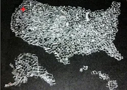 Strengthened Gorilla glass cut into 1 mm cubes using FiLaser's patented glass process is arranged in the shape of the US, with FiLaser's headquarters in Portland, OR indicated in red. Strengthened Gorilla glass cut into 1 mm cubes using FiLaser's patented glass process is arranged in the shape of the US, with FiLaser's headquarters in Portland, OR indicated in red.