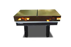 Richardson Gratings’ large mosaic echelle grating is shown on a Newport optical workstation. Richardson Gratings’ large mosaic echelle grating is shown on a Newport optical workstation.