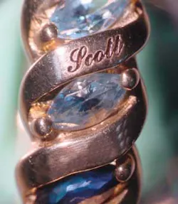 FIGURE 6. Small spot size lasers enable family ring engraving/personalization in gold. FIGURE 6. Small spot size lasers enable family ring engraving/personalization in gold.