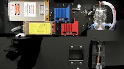 FIGURE 4. Two lasers are shown mounted on the front of the optical plate. The other two lasers are mounted in a symmetric fashion on the back side of the plate, and the spatially separated beams are combined using dichroic filters. FIGURE 4. Two lasers are shown mounted on the front of the optical plate. The other two lasers are mounted in a symmetric fashion on the back side of the plate, and the spatially separated beams are combined using dichroic filters.