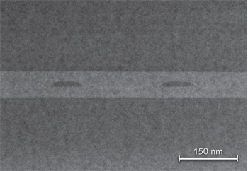 FIGURE 1. A transmission electron micrograph shows the Brightlock monolithic diffraction-grating spectral control layer within a high-power laser diode.