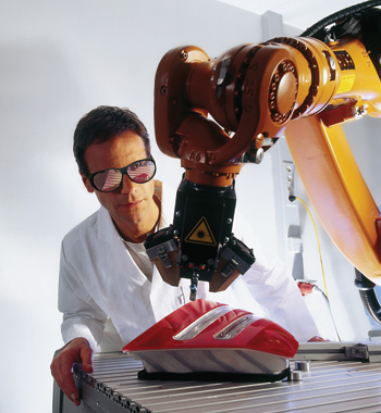 FIGURE 1. Laservision's T5K11 eyewear can be used for multiple laser applications, including infrared welding of an automotive tail light assembly with a 1064 nm Class 4 Nd:YAG laser.