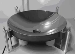 FIGURE 2. A full-size, 600-mm-diameter mirror has just completed the coating step. The central aperture is the entrance position of the laser beam into the plasma chamber in the current source configuration. FIGURE 2. A full-size, 600-mm-diameter mirror has just completed the coating step. The central aperture is the entrance position of the laser beam into the plasma chamber in the current source configuration.