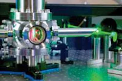 FIGURE 1. A cryogenically cooled Ti:sapphire laser amplifier crystal is pumped by a frequency-doubled Nd:YLF laser. FIGURE 1. A cryogenically cooled Ti:sapphire laser amplifier crystal is pumped by a frequency-doubled Nd:YLF laser.