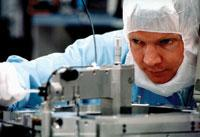 ASML's fourth-generation immersion lithography tool relies on a catadioptric lens design developed in collaboration with Carl Zeiss to achieve a numerical aperture of 1.2.