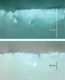 FIGURE 1. Surface quality is not a reliably predictable indicator of subsurface damage. The smoother and flatter surface in one sample (top) belies its much more extensive subsurface damage in comparison to a second sample (bottom). While some subsurface damage manifests itself as straight &ldquo;pinholes&rdquo; in the surface, cracks with the more characteristic &ldquo;lightning bolt&rdquo; shapes shown in these samples are impossible to probe visually or mechanically to their full depth.