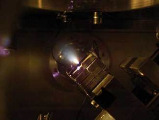 A void in sapphire was created by a single 200 fs, 200 nJ pulse. No perceptible cracks were present after the void was formed. The transient pressure reached 10 TPA or more.