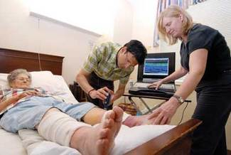 Researchers from Georgia Institute of Technology and Georgia Tech Research Institute test a prototype handheld imaging device that combines multispectral and acoustic imaging technologies to detect early-stage pressure ulcers and the more serious deep-tissue injuries.