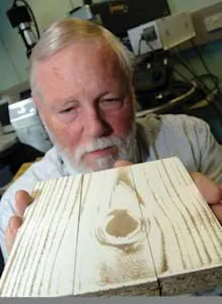 Lasers are used to imprint a wood-grain design onto the surface of medium-density fiberboard, giving it the appearance of expensive wood. Lasers are used to imprint a wood-grain design onto the surface of medium-density fiberboard, giving it the appearance of expensive wood.