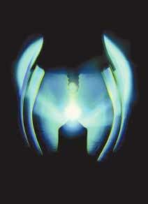 FIGURE 1. The small, bright arc of a short-arc lamp allows for great flexibility in shaping the emitted light for illumination and other uses. Proper power-supply design is crucial to the stability of an arc lamp's optical output.