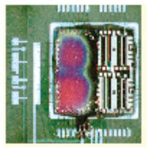 FIGURE 1. Liquid-crystal thermography reveals hot spots on a component die.