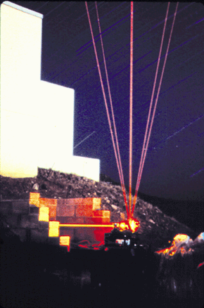 Laser-induced fluorescence from sodium atoms at altitudes between 80 and 105 km has been used to determine density, temperature, and wind velocity. In this experiment, run by the remote-sensing group at the University of Illinois, the transmitter beam is moved to several different positions to determine the three components of the wind velocity. The fully steerable, 3.5-m receiving telescope is housed in the building to the left.