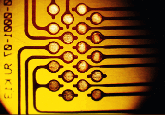 FIGURE 1. The flexible printed circuit is one kind of microelectronics packaging that benefits from laser micromachining; others are ball grid arrays, multichip modules, and micro vias.