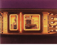 With the aid of integrated optics and CMOS modulation/demodulation electronics, bidirectional transceiver integrates diode-laser-based transmitter (left), with a receiver (right), and a connector.