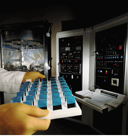 Right-angle prisms with a polarizing beamsplitting coating will be assembled face-to-face to form beamsplitter cubes in distance-measuring interferometers from Zygo Corp. (Middlefield, CT).