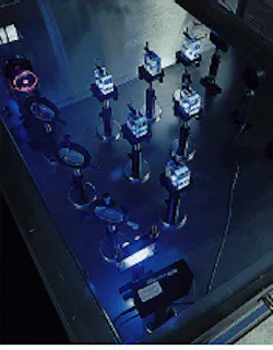FIGURE 1. Fused silica samples are irradiated with an argon fluoride excimer laser beam to evaluate performance in 193-nm lithographic systems. Visible fluorescence is indicative of the absorption of 193-nm radiation, though the correlation between the two is not straightforward. FIGURE 1. Fused silica samples are irradiated with an argon fluoride excimer laser beam to evaluate performance in 193-nm lithographic systems. Visible fluorescence is indicative of the absorption of 193-nm radiation, though the correlation between the two is not straightforward.