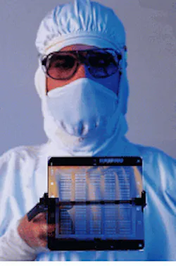 High-purity quartz photomask containing precision image of an integrated circuit is used to pattern the circuit image onto a semiconductor wafer. High-purity quartz photomask containing precision image of an integrated circuit is used to pattern the circuit image onto a semiconductor wafer.