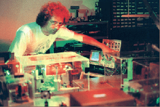 An interferometric autocorrelator is used to analyze the output of a femtosecond Ti:sapphire laser system at the Center for Research and Education in Optics and Lasers at the University of Central Florida in Orlando. The autocorrelator output is visible on the oscilloscope.