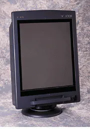 FIGURE 2. The Voxbox optically reconstructs holographic interference patterns stored on special film. The tungsten halogen illuminated lightbox recreates a life-size anatomical image using a patented process of dispersion compensation. FIGURE 2. The Voxbox optically reconstructs holographic interference patterns stored on special film. The tungsten halogen illuminated lightbox recreates a life-size anatomical image using a patented process of dispersion compensation.