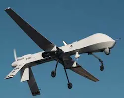 FIGURE 1. The MQ-1 Predator, which has seen combat over Bosnia/Serbia and the Middle East, can carry a dual-missile payload (top). Visual information including video is transmitted to a ground station for analysis (bottom). Here, U.S. Air Force Captain Richard Koll, left, and Airman First Class Mike Eulo, right, perform function checks at Balad Air Base, Iraq, after Predator launch. Koll and Eulo control the Predator in a radius of approximately 25 miles around the base before handing it off to controllers stationed in the U.S. to continue its flight. FIGURE 1. The MQ-1 Predator, which has seen combat over Bosnia/Serbia and the Middle East, can carry a dual-missile payload (top). Visual information including video is transmitted to a ground station for analysis (bottom). Here, U.S. Air Force Captain Richard Koll, left, and Airman First Class Mike Eulo, right, perform function checks at Balad Air Base, Iraq, after Predator launch. Koll and Eulo control the Predator in a radius of approximately 25 miles around the base before handing it off to controllers stationed in the U.S. to continue its flight.