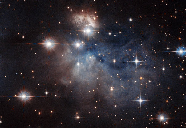 Showcased at the center of this NASA/ESA Hubble Space Telescope image is an emission-line star known as IRAS 12196-6300. This star displays prominent emission lines that, when compared to the 'fingerprints' left by particular atoms and molecules, can be used to reveal IRAS 12196-6300's chemical composition. This is just some of the groundbreaking work being done by the Hubble Space Telescope. (Image credit: ESA/Hubble & NASA; acknowledgement: Judy Schmidt)